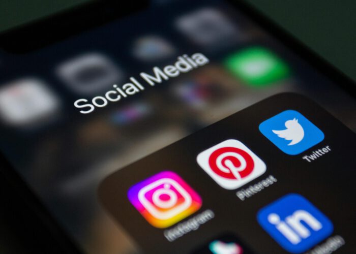 A smartphone screen displaying popular social media applications like Instagram and Twitter.